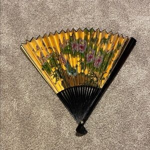 Elegant Gold and Black Decorative Fan